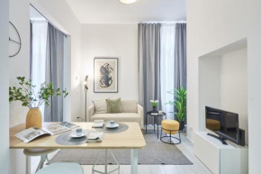 Elegante appartamento minimal dai tocchi botanici